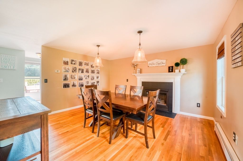 Dining room, Fireplace, Interior, Pendant Lights, Wood Texture Flooring