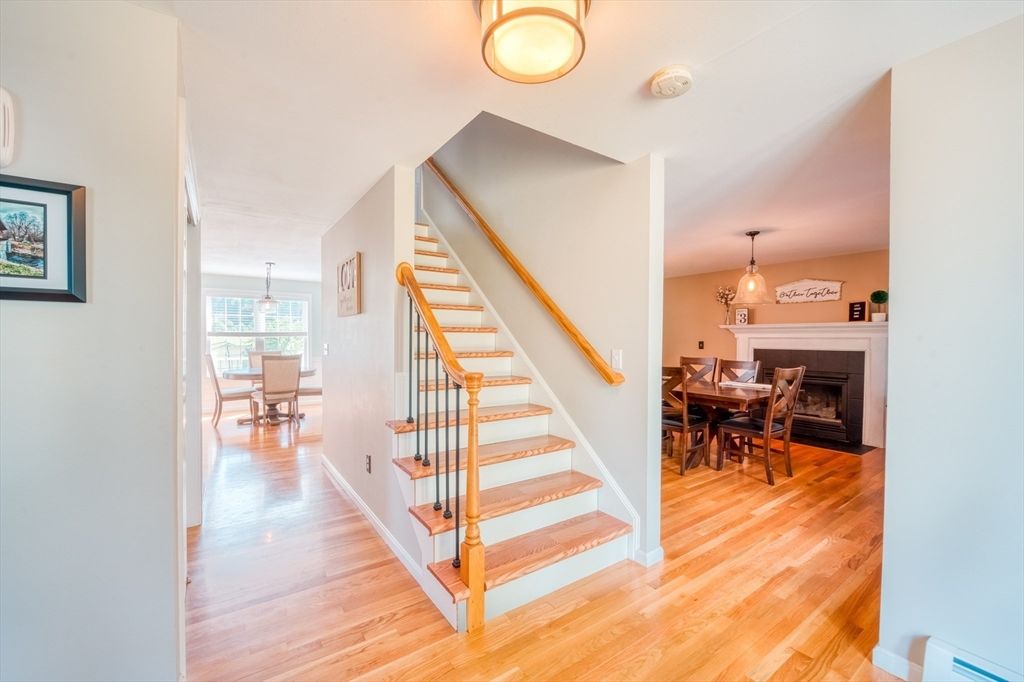 Dining room, Fireplace, Interior, Pendant Lights, Wood Texture Flooring
