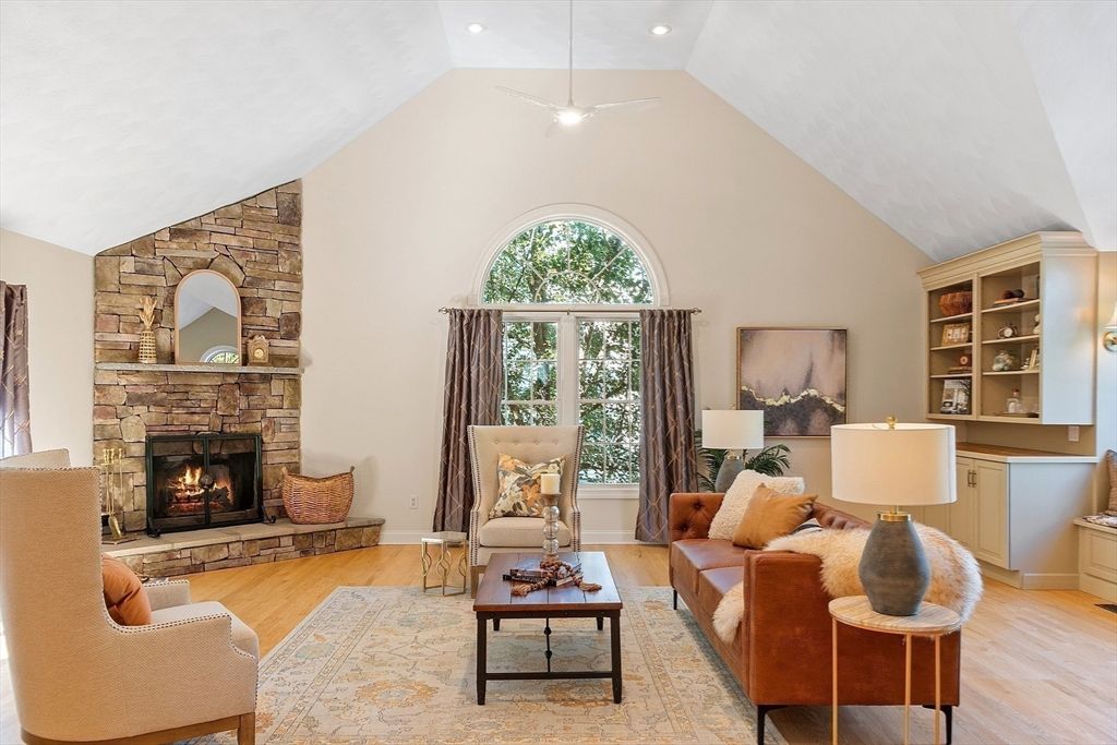 Fireplace, Interior, Living room, Recessed Lighting, Stone Walls, Wood Texture Flooring