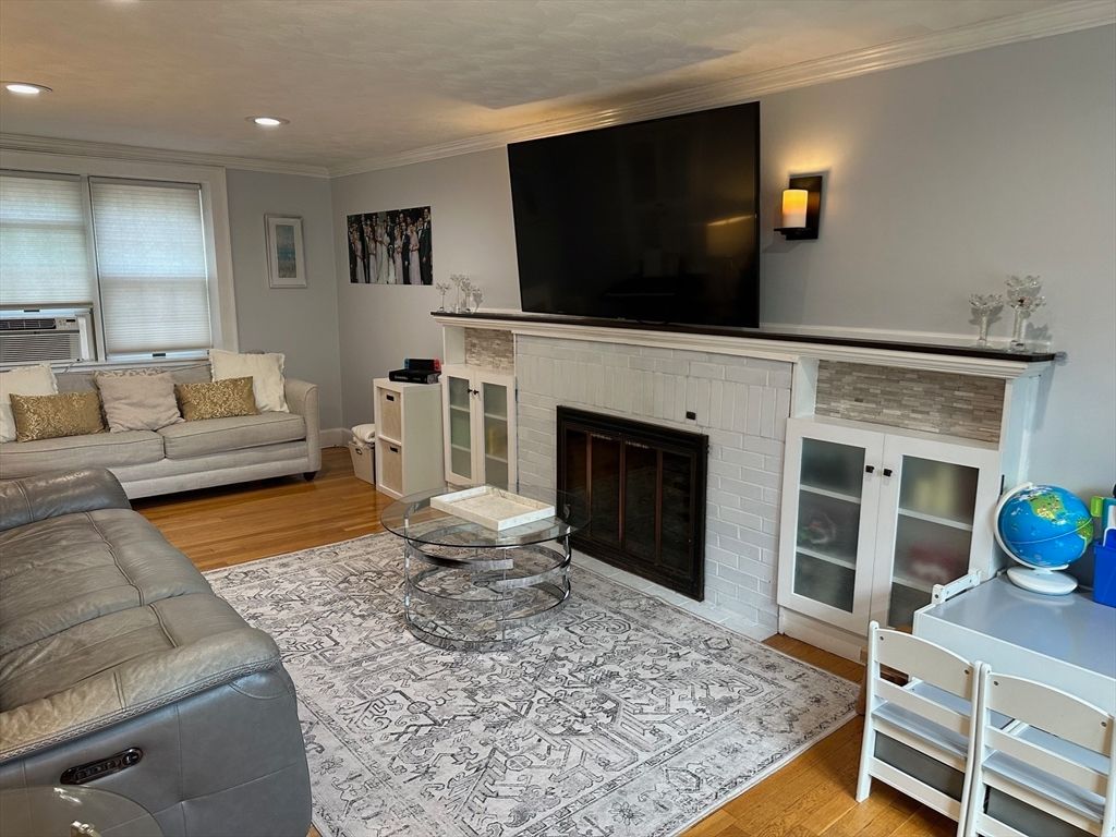 Fireplace, Interior, Living room, Recessed Lighting, Wood Texture Flooring