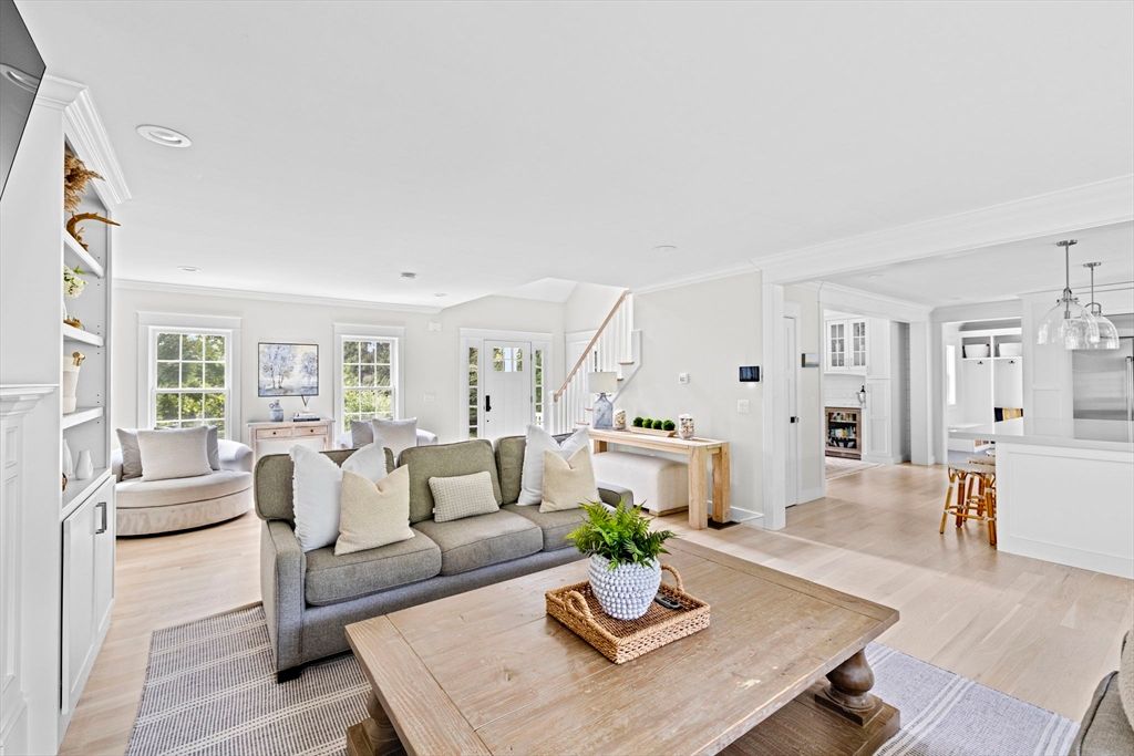 Dining room, Fireplace, Interior, Living room, Pendant Lights, Recessed Lighting, Wood Texture Flooring