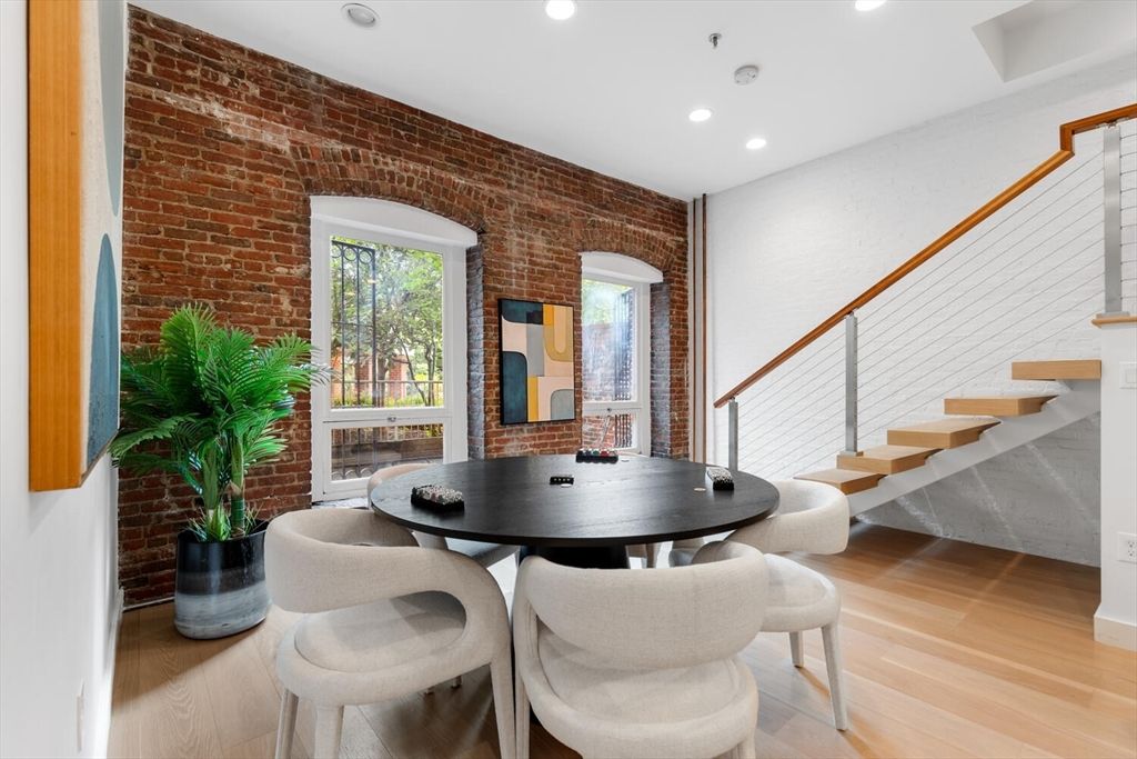 Dining room, Fireplace, Interior, Recessed Lighting, Stone Walls, Wood Texture Flooring