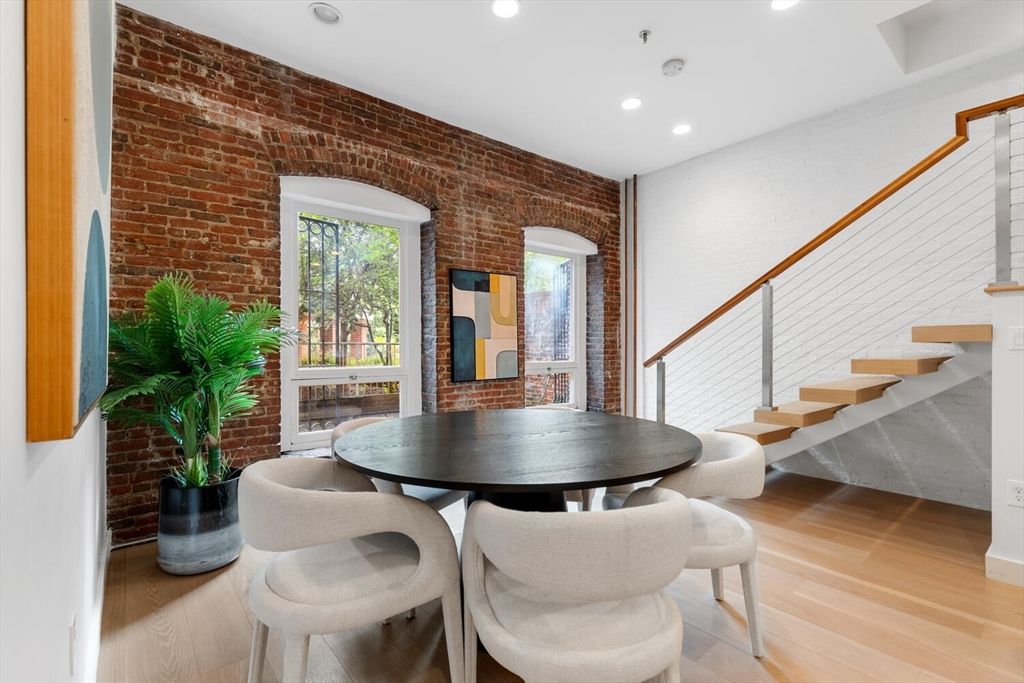 Dining room, Fireplace, Interior, Recessed Lighting, Stone Walls, Wood Texture Flooring