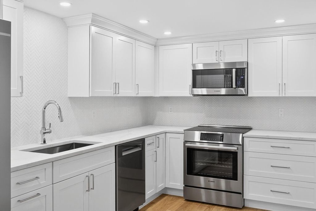 Interior, Kitchen, Recessed Lighting, Stainless Steel Appliances, Wood Texture Flooring