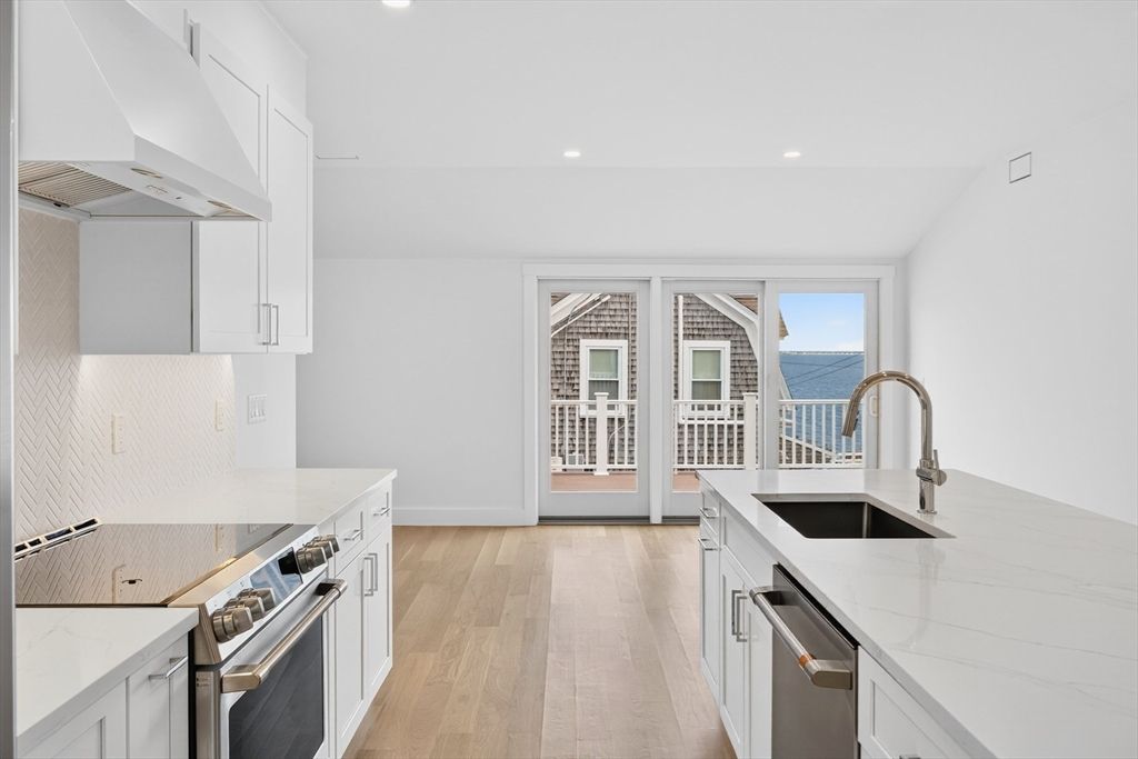 Interior, Kitchen, Recessed Lighting, Stainless Steel Appliances, Water, Wood Texture Flooring