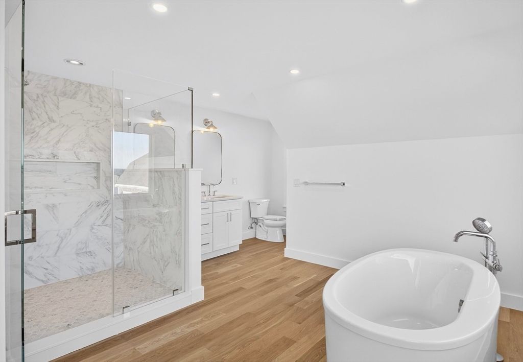 Bathroom, Glass Shower, Interior, Marble Walls, Recessed Lighting, Wood Texture Flooring