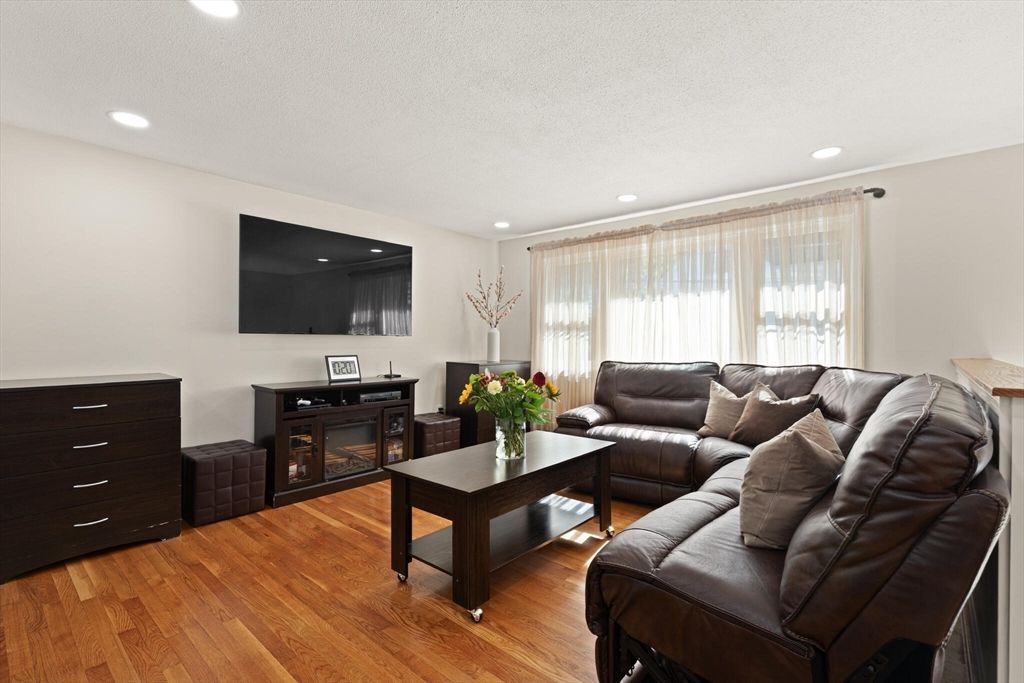 Fireplace, Interior, Living room, Recessed Lighting, Wood Texture Flooring