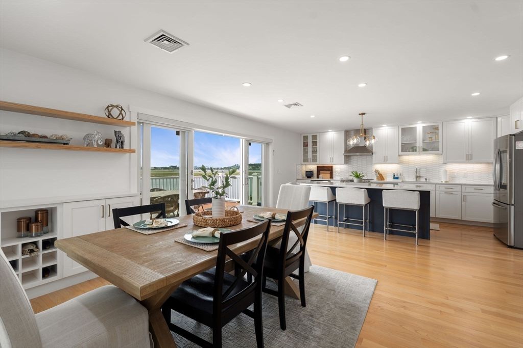 Dining room, Interior, Kitchen, Pendant Lights, Recessed Lighting, Stainless Steel Appliances, Wood Texture Flooring