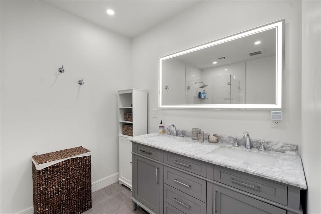 Bathroom, Dual Sink Vanities, Interior, Recessed Lighting, Wood Texture Flooring