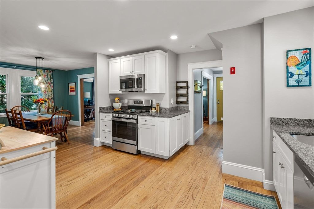 Dining room, Interior, Kitchen, Pendant Lights, Recessed Lighting, Stainless Steel Appliances, Wood Texture Flooring