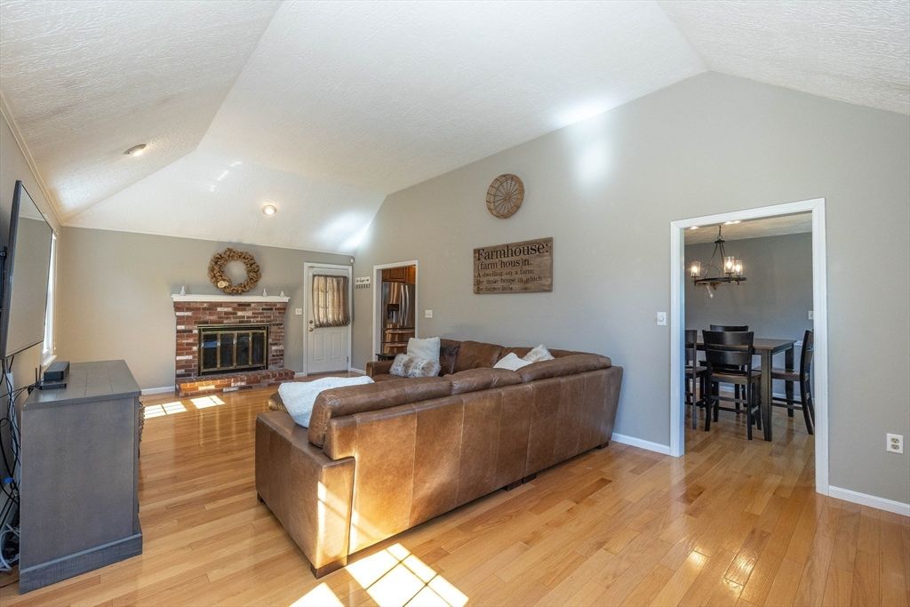 Chandelier, Dining room, Fireplace, Interior, Living room, Wood Texture Flooring