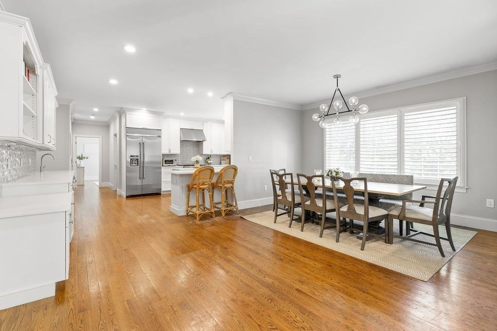 Dining room, Interior, Kitchen, Pendant Lights, Recessed Lighting, Stainless Steel Appliances, Wood Texture Flooring