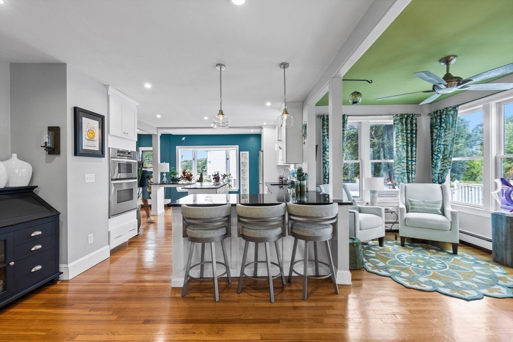 Dining room, Interior, Kitchen, Pendant Lights, Recessed Lighting, Stainless Steel Appliances, Wood Texture Flooring