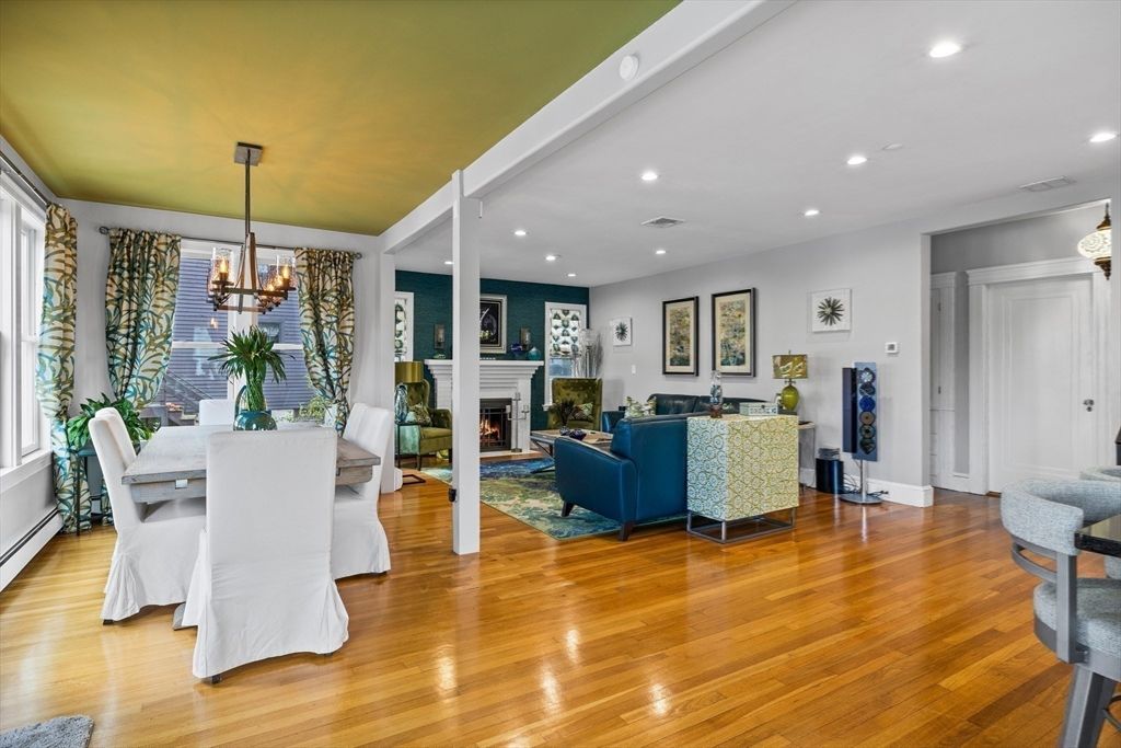 Chandelier, Dining room, Fireplace, Interior, Living room, Recessed Lighting, Wood Texture Flooring