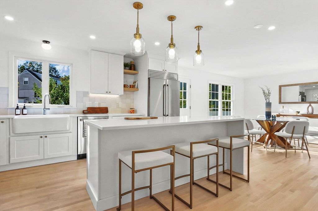 Dining room, Interior, Kitchen, Pendant Lights, Recessed Lighting, Stainless Steel Appliances, Wood Texture Flooring