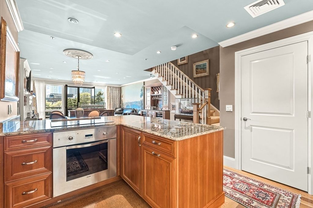 Chandelier, Interior, Kitchen, Pendant Lights, Recessed Lighting, Stainless Steel Appliances, Wood Texture Flooring