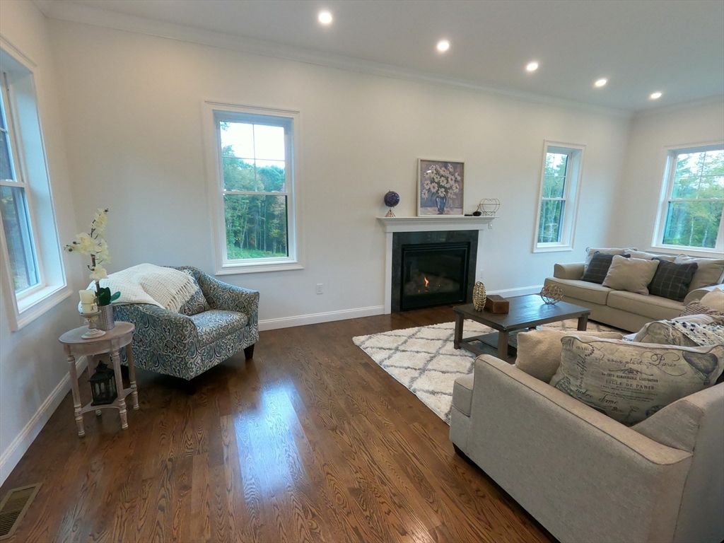 Fireplace, Interior, Living room, Recessed Lighting, Wood Texture Flooring