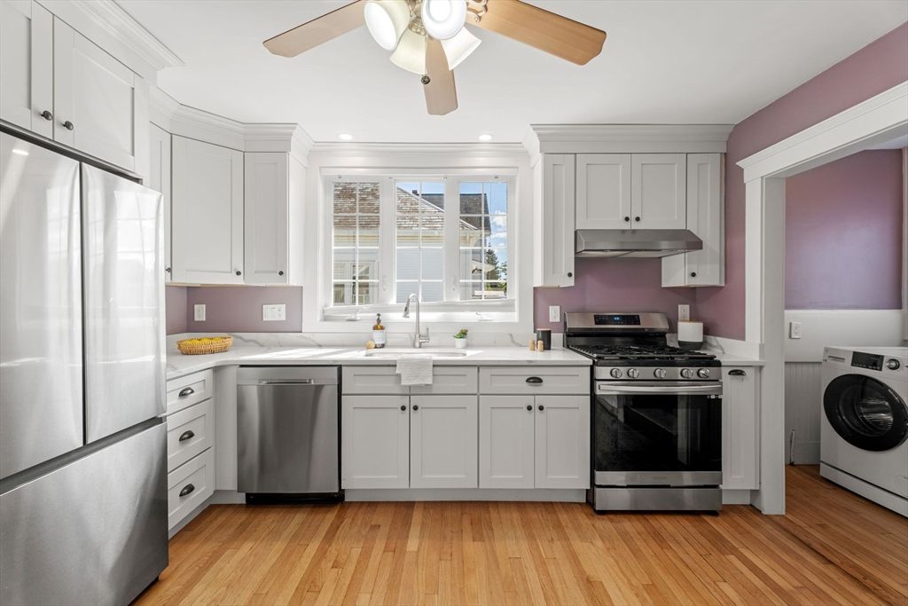 Interior, Kitchen, Recessed Lighting, Stainless Steel Appliances, Washer, Wood Texture Flooring