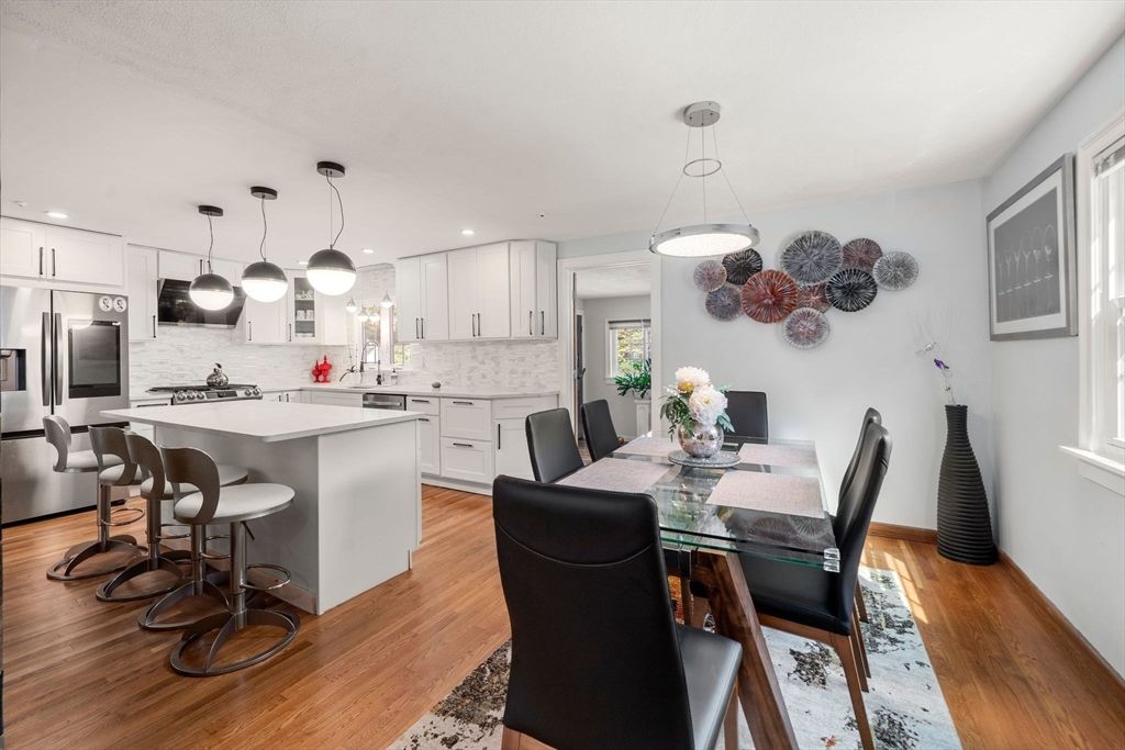 Dining room, Interior, Kitchen, Pendant Lights, Recessed Lighting, Stainless Steel Appliances, Wood Texture Flooring