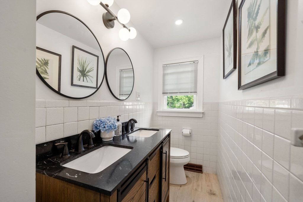 Bathroom, Dual Sink Vanities, Interior, Recessed Lighting, Wood Texture Flooring