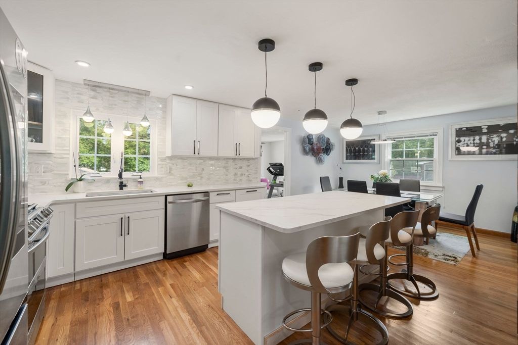 Dining room, Interior, Kitchen, Pendant Lights, Recessed Lighting, Stainless Steel Appliances, Wood Texture Flooring