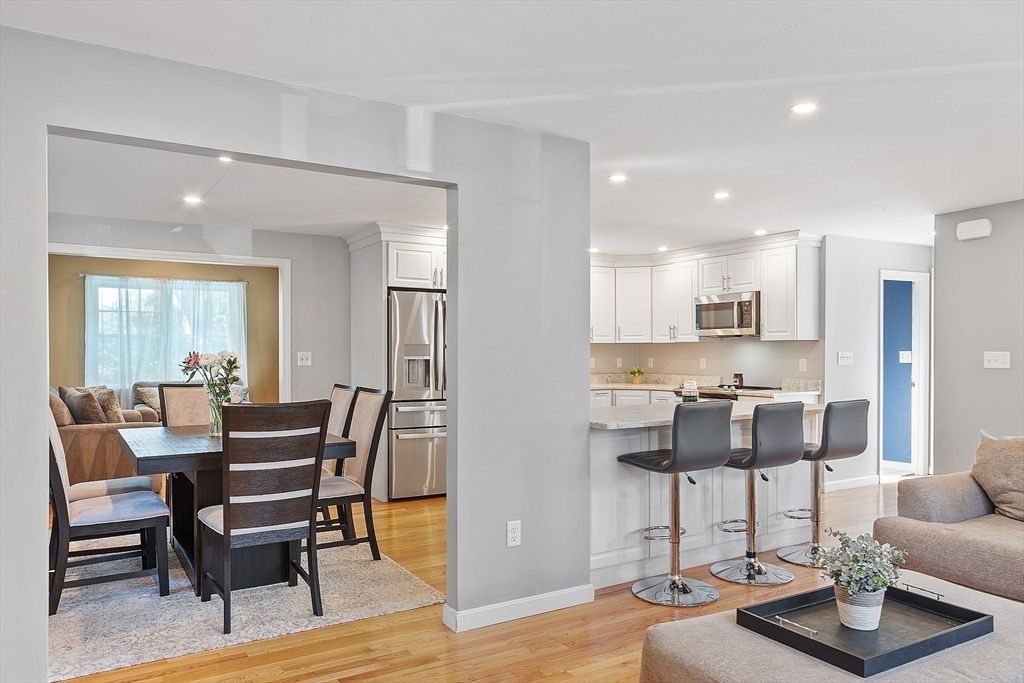 Dining room, Interior, Kitchen, Living room, Recessed Lighting, Stainless Steel Appliances, Wood Texture Flooring
