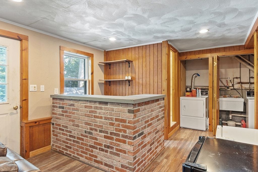 Interior, Recessed Lighting, Stone Walls, Washer, Wood Texture Flooring