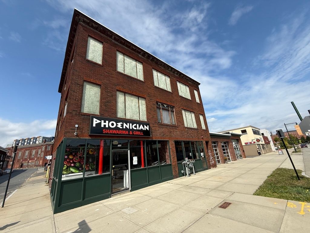 Exterior, Facade, Brick Facade, Condo Building