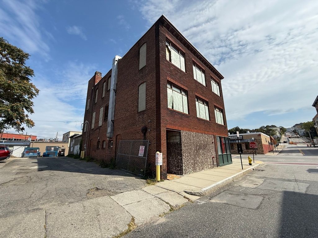 Exterior, Facade, Brick Facade, Condo Building