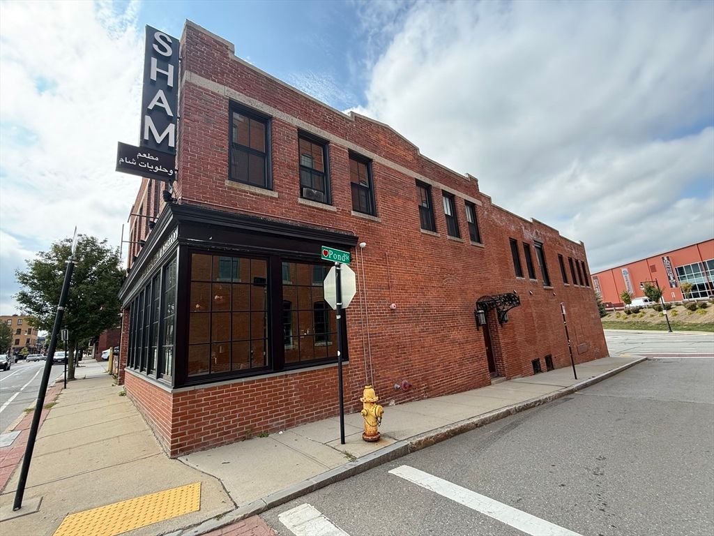 Exterior, Facade, Brick Facade, Condo Building