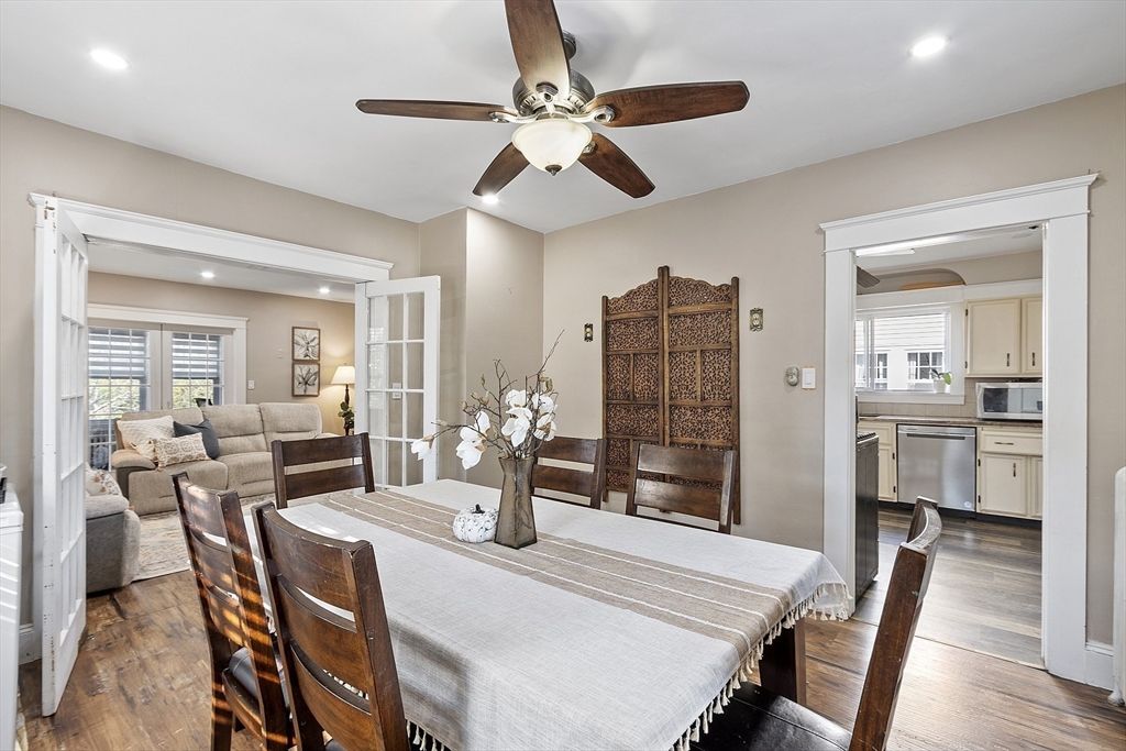 Dining room, Interior, Kitchen, Living room, Recessed Lighting, Stainless Steel Appliances, Wood Texture Flooring