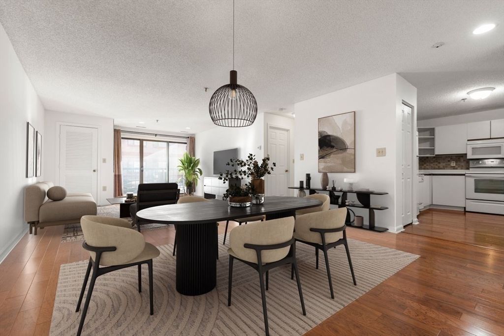 Dining room, Interior, Kitchen, Pendant Lights, Recessed Lighting, Stainless Steel Appliances, Wood Texture Flooring