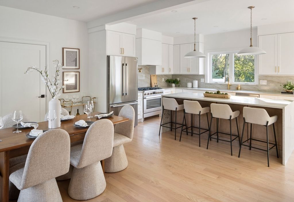 Dining room, Interior, Kitchen, Pendant Lights, Recessed Lighting, Stainless Steel Appliances, Wood Texture Flooring