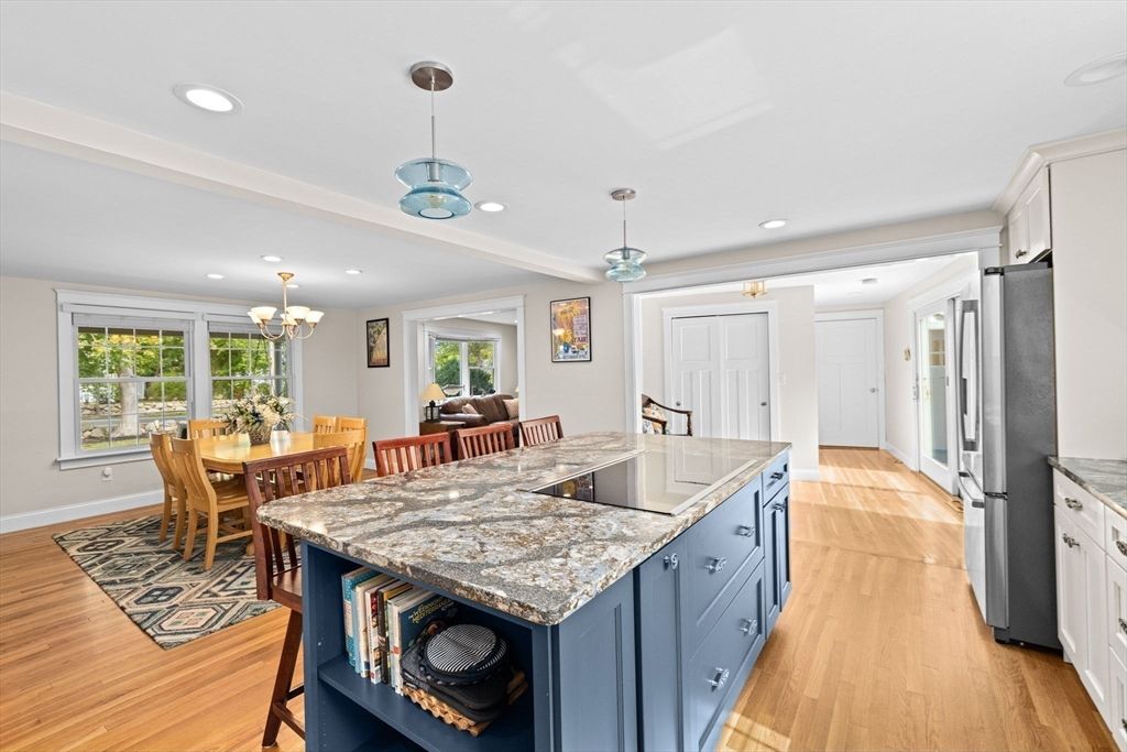 Chandelier, Dining room, Interior, Kitchen, Pendant Lights, Recessed Lighting, Stainless Steel Appliances, Wood Texture Flooring