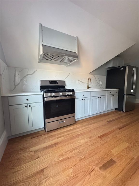 Interior, Kitchen, Marble Walls, Stainless Steel Appliances, Wood Texture Flooring