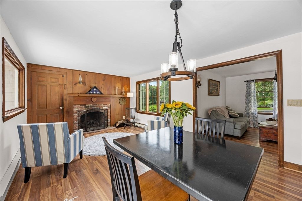 Dining room, Fireplace, Interior, Living room, Pendant Lights, Wood Texture Flooring, Wooden Walls