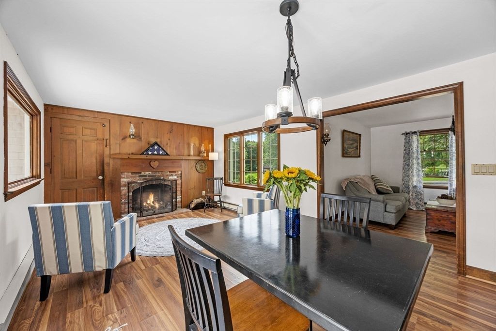 Dining room, Fireplace, Interior, Living room, Pendant Lights, Wood Texture Flooring, Wooden Walls