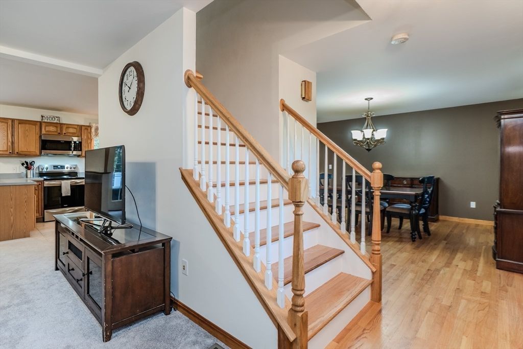 Chandelier, Dining room, Interior, Kitchen, Stainless Steel Appliances, Wood Texture Flooring