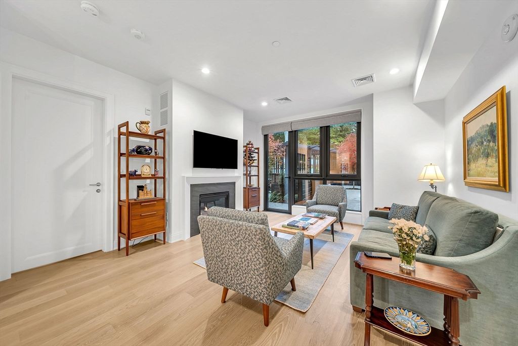 Fireplace, Interior, Living room, Recessed Lighting, Wood Texture Flooring