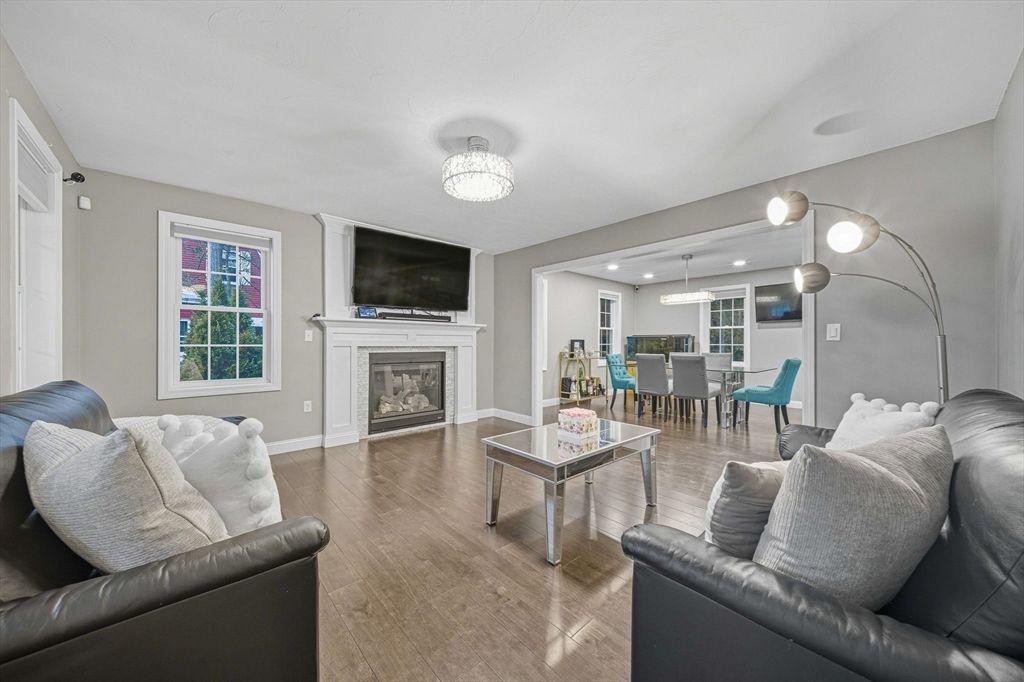Dining room, Fireplace, Interior, Living room, Pendant Lights, Recessed Lighting, Wood Texture Flooring