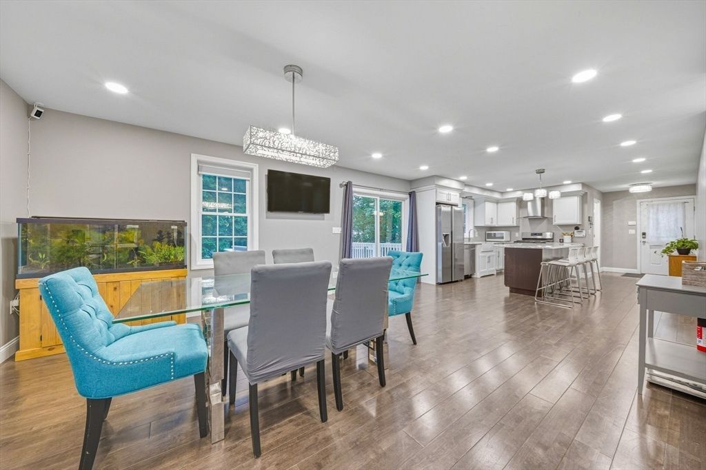 Chandelier, Dining room, Interior, Kitchen, Pendant Lights, Recessed Lighting, Stainless Steel Appliances, Wood Texture Flooring