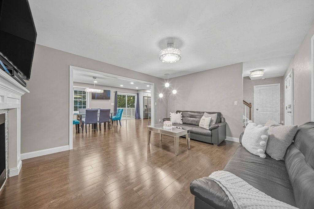 Dining room, Fireplace, Interior, Living room, Pendant Lights, Recessed Lighting, Wood Texture Flooring