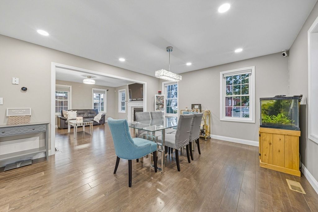 Chandelier, Dining room, Fireplace, Interior, Living room, Recessed Lighting, Wood Texture Flooring