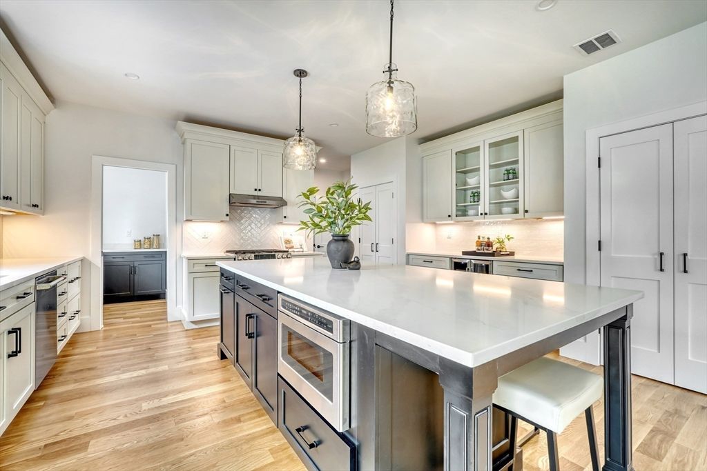 Interior, Kitchen, Pendant Lights, Recessed Lighting, Stainless Steel Appliances, Wood Texture Flooring
