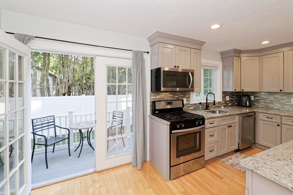 Dining room, Interior, Kitchen, Recessed Lighting, Stainless Steel Appliances, Wood Texture Flooring