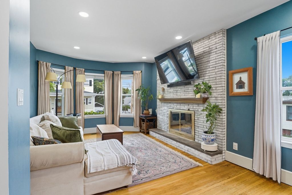 Bedroom, Fireplace, Interior, Recessed Lighting, Stone Walls, Wood Texture Flooring