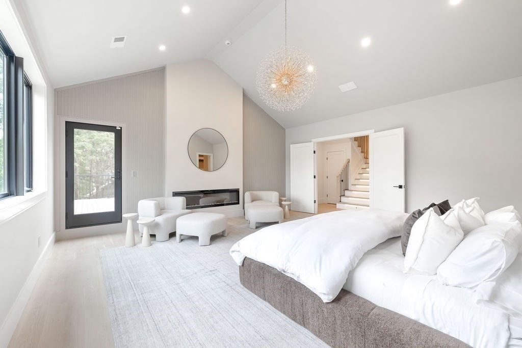 Bedroom, Chandelier, Fireplace, Interior, Recessed Lighting, Wood Texture Flooring