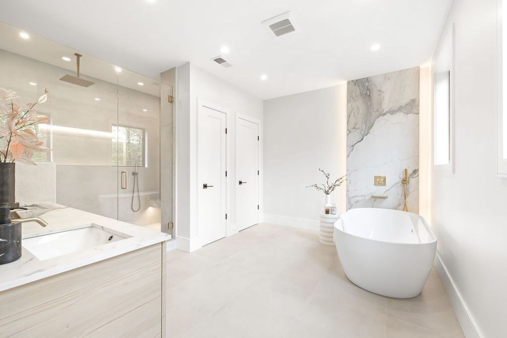 Bathroom, Dual Sink Vanities, Free Standing Baths, Glass Shower, Interior, Marble Walls, Recessed Lighting