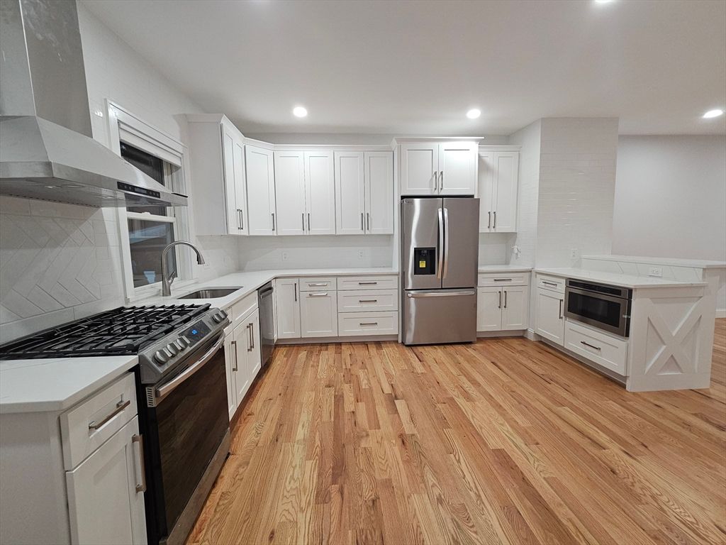 Interior, Kitchen, Recessed Lighting, Stainless Steel Appliances, Wood Texture Flooring