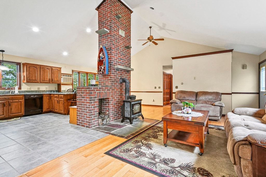 Fireplace, Interior, Kitchen, Living room, Pendant Lights, Recessed Lighting, Stone Walls, Wood Texture Flooring